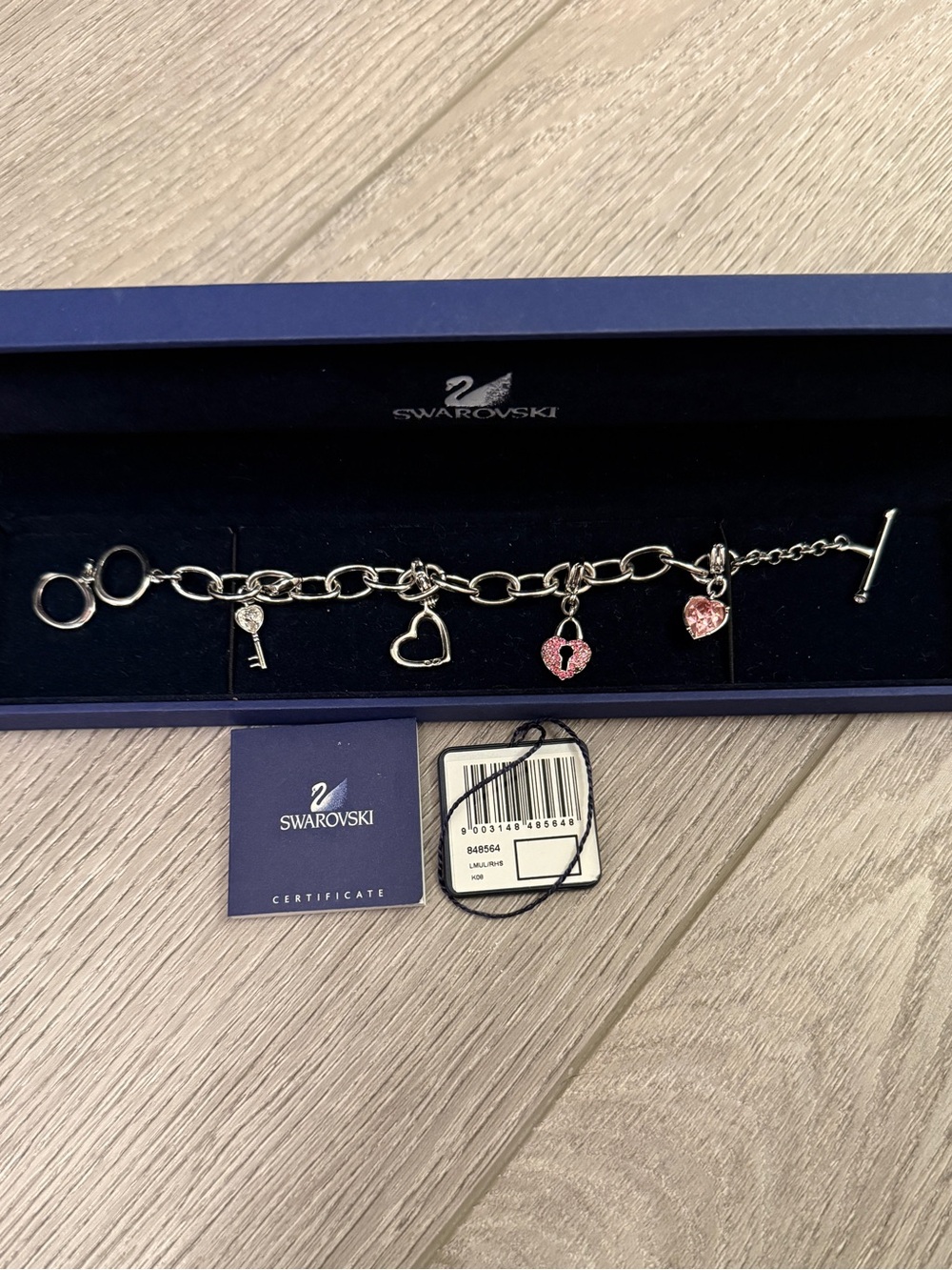 Swarovski Silver-Tone Charm Bracelet with Pink Crystal Hearts